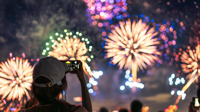 girl watching a firework display. 